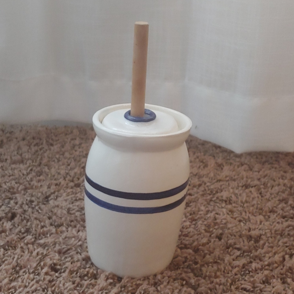 Vintage white and blue butter churn